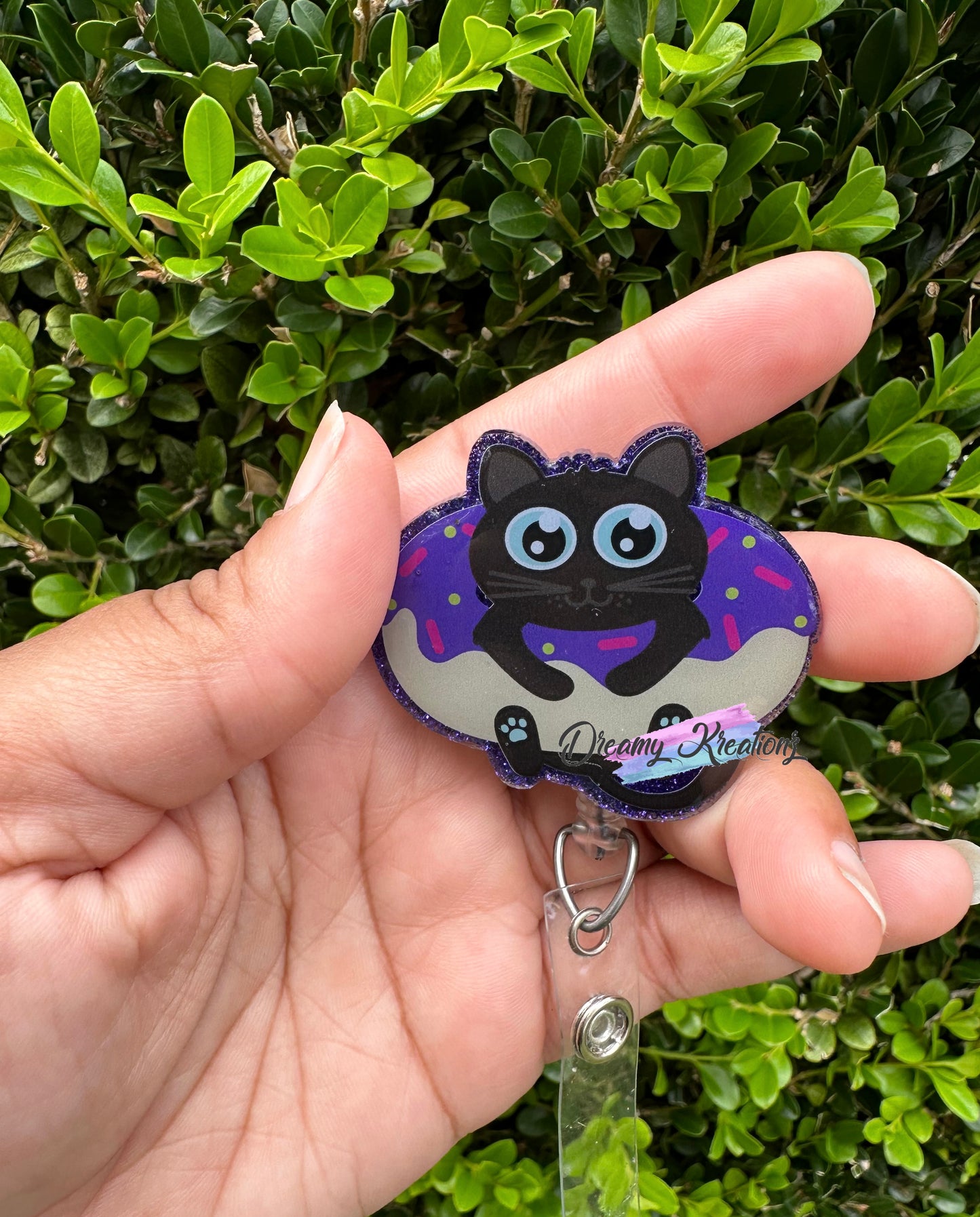 Dougnut kitten badge reel